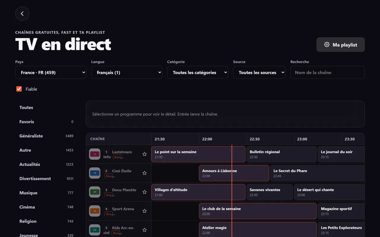 Onglet TV&nbsp;: les chaînes de la playlist apparaissent dans la grille avec le guide des programmes, chacune avec son numéro et le badge «&nbsp;Box&nbsp;», et les catégories sont listées à gauche.